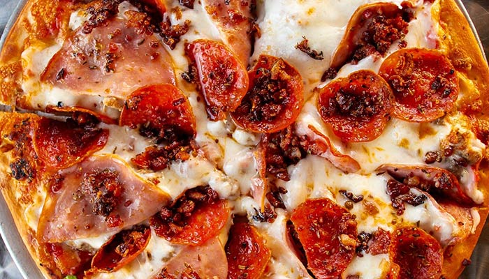 Ledgens Meat Pizza served at multiple Texas locations