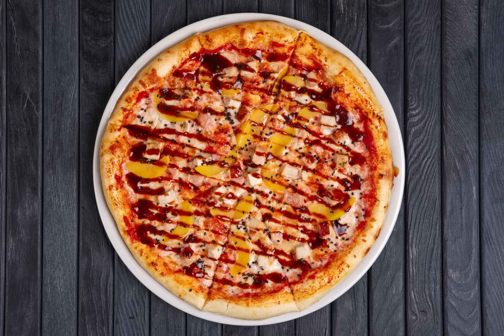 top-view-of-pizza-with-chicken-plum-and-barbecue-2026-01-07-00-14-22-utc_11zon